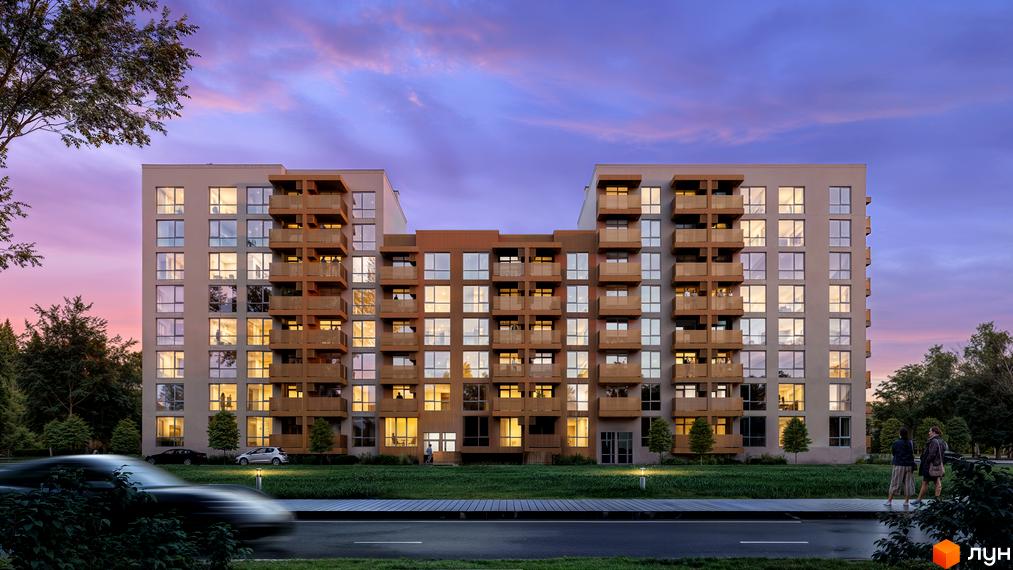 Житловий комплекс AUROOM DISTRICT: багатоповерховий будинок зі світлим фасадом, балконами та освітленими вікнами. Перед будинком зелена територія, дорога та дерева.