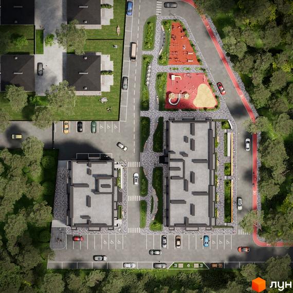 Аерофото Житлового комплексу Soborniy: два багатоповерхові будинки, оточені парковками, зеленими зонами, дитячими майданчиками та велодоріжкою.