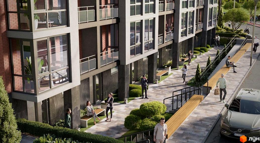 Багатоповерховий будинок Житлового комплексу Soborniy з великими вікнами та балконами. Прибудинкова територія облаштована пішохідними доріжками, зеленими насадженнями та дерев'яними лавками.