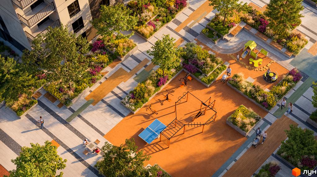 Житловий комплекс Park Residence: вид зверху на будівлю та облаштовану прибудинкову територію з дитячим майданчиком, зонами відпочинку та спортивними тренажерами.