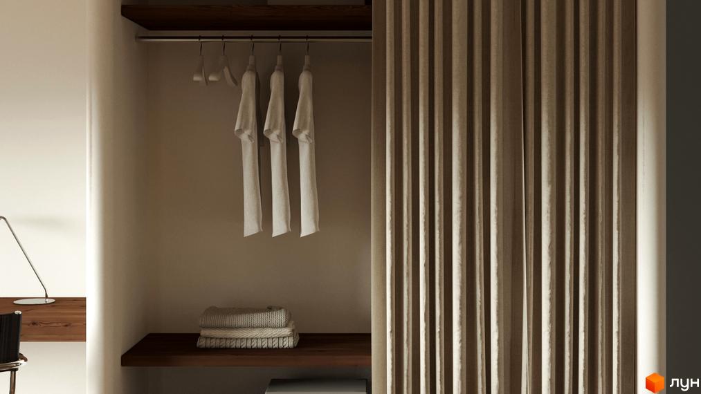 Гардеробна зона з полицями та вішаками для одягу в квартирі житлового комплексу З.40. Інтер'єр має світлі штори та дерев'яні полиці.