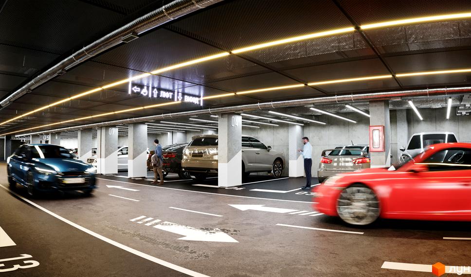 Підземний паркінг ЖК CITY PARK з позначеними місцями та освітленням. Автомобілі припарковані вздовж стін, люди користуються паркінгом.