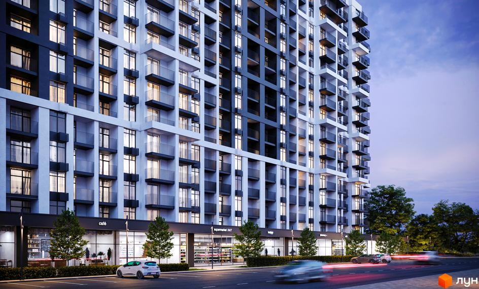 Новобудова CITY PARK з балконами та панорамними вікнами, фасадом з білих та темних панелей, з магазинами та деревами на першому поверсі, на тлі вечірнього неба.