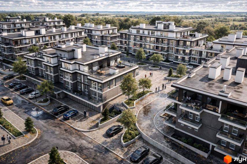 Зовнішній вигляд житлового комплексу ParkWill з сірими фасадами та білими елементами, балконами та парковкою. Навколо комплексу розташована зелена прибудинкова територія з деревами та доріжками.