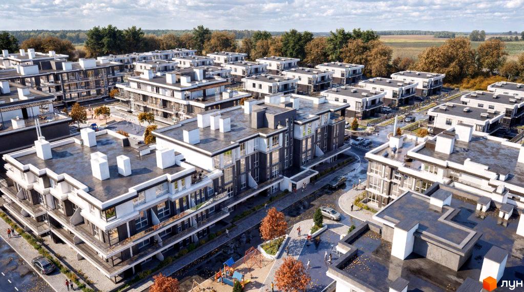 Зовнішній вигляд житлового комплексу KMParkWill з сучасними будівлями та доглянутою прибудинковою територією з дитячим майданчиком.