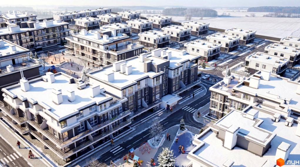 Комплекс ParkWill у зимовий період з білими дахами та засніженою прибудинковою територією. На зображенні видно дитячий майданчик та дороги між будинками.