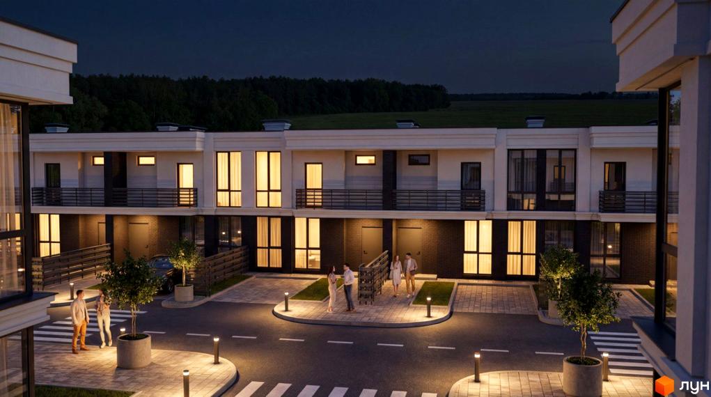 Котеджне містечко ParkWill вночі: двоповерхові будинки з великими вікнами та балконами. Прибудинкова територія освітлена, з доріжками та деревами.
