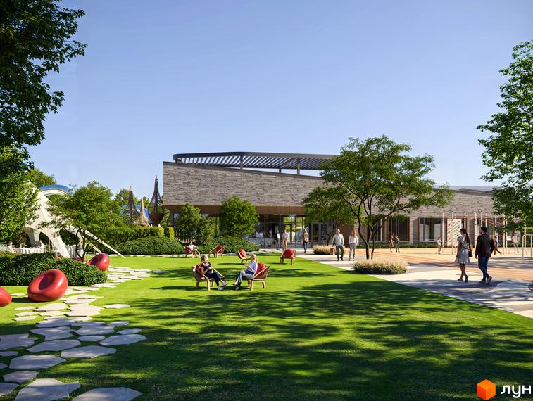 Фасад Апарт-готель ONOKY River Club з фактурних панелей та великими вікнами. Прибудинкова територія має зелений газон, доріжки та зони відпочинку з кріслами.