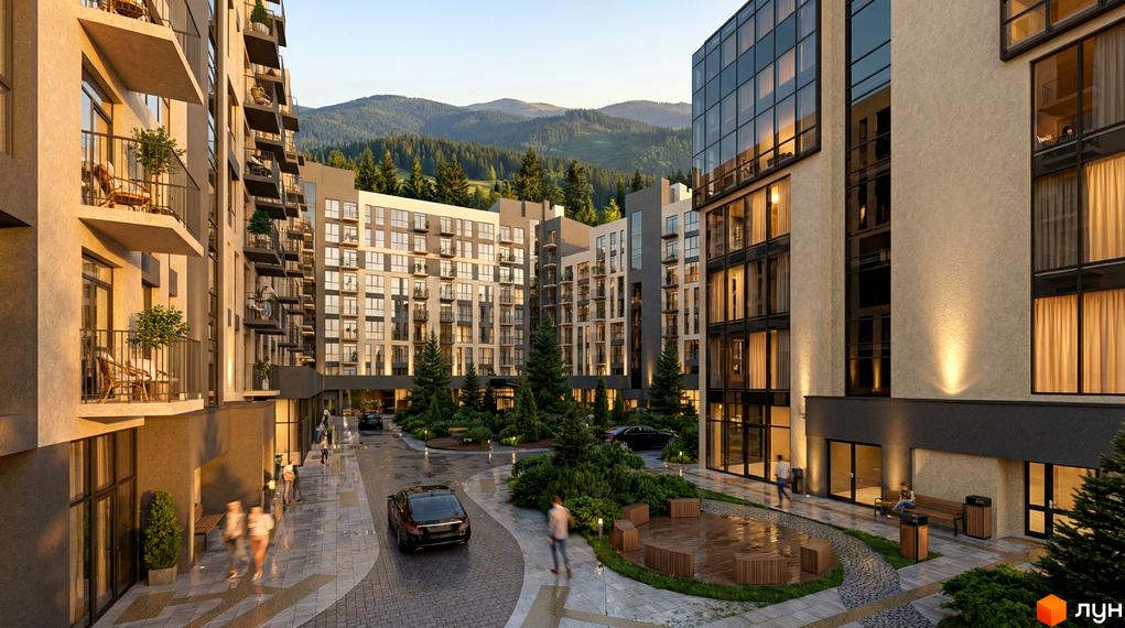 Житловий комплекс Skogur City з фасадами з бежевої штукатурки та скляними елементами, оточений зеленими насадженнями та гірським пейзажем.