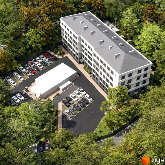 Новобудова Comfort Hall з багатоповерховими будинками та прибудинковою територією з парковкою та зеленими насадженнями.