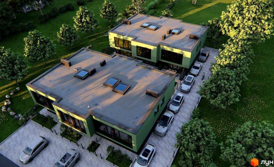 Аерофотографія таунхаусів Balance Houses з зеленими фасадами та великими вікнами. Навколо будинків розташовані парковки, доглянуті газони та дерева.