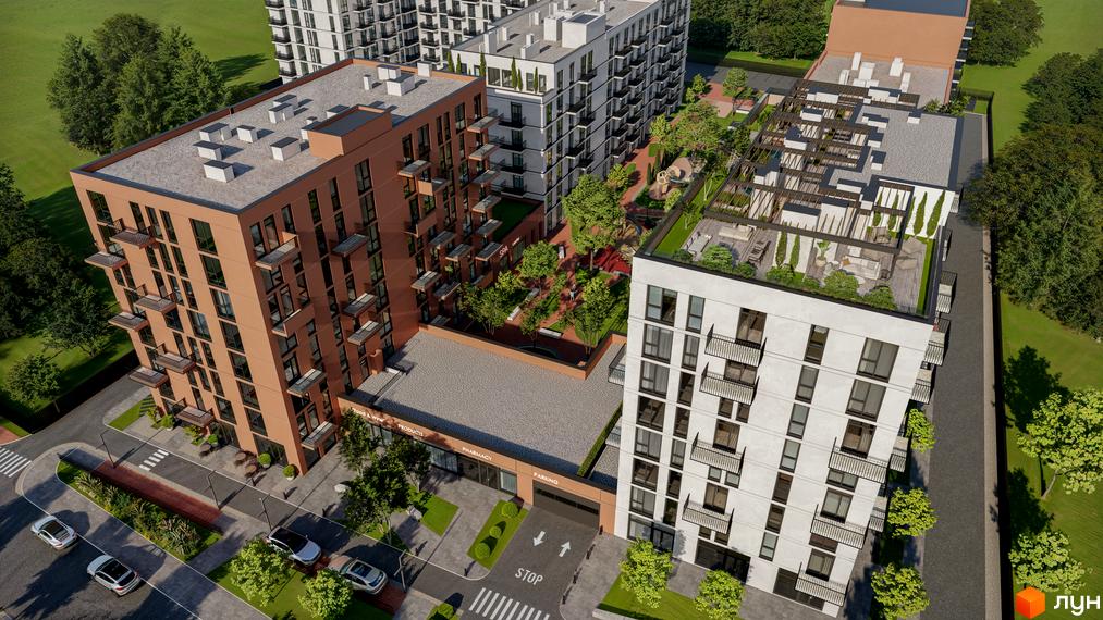 Житловий комплекс Aqua Vita з цегляними та білими фасадами, балконами та зеленою прибудинковою територією з дитячим майданчиком.