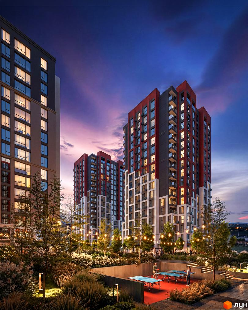 Irpin City - новобудова з червоно-сірими фасадами та великими вікнами. На прибудинковій території розташовані зони відпочинку з настільним тенісом та освітленням.