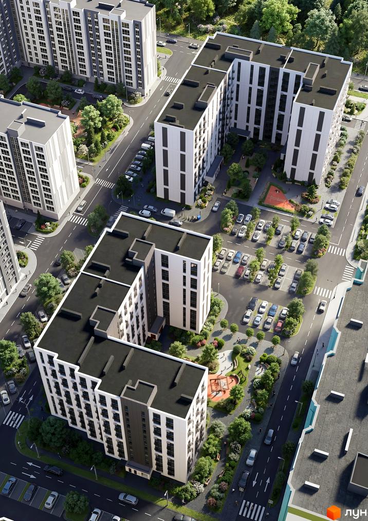 Новобудова ЖК Евромісто з білими фасадами та чорними дахами, оточена зеленими деревами та місцями для відпочинку.