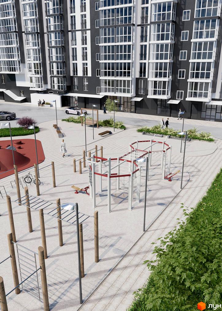 Новобудова ЖК ТИSHA з сірими та білими фасадами, великими вікнами та спортивним майданчиком на прибудинковій території.