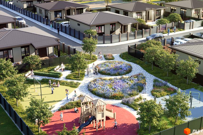 Котеджне містечко Твід: вид зверху на одноповерхові будинки з коричневими дахами та облаштовану прибудинкову територію з ігровими зонами та клумбами.