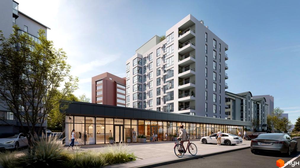 Зовнішній вигляд житлового комплексу на вул. Скоропадського, 10а, з фасадами різної поверховості та прибудинковою територією з парковкою та зеленими насадженнями.