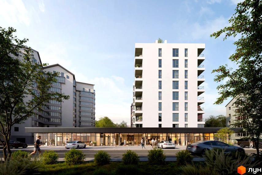 Зовнішній вигляд новобудови вул. Скоропадського, 10а, з комерційними приміщеннями на першому поверсі та прибудинковою територією з деревами та кущами.