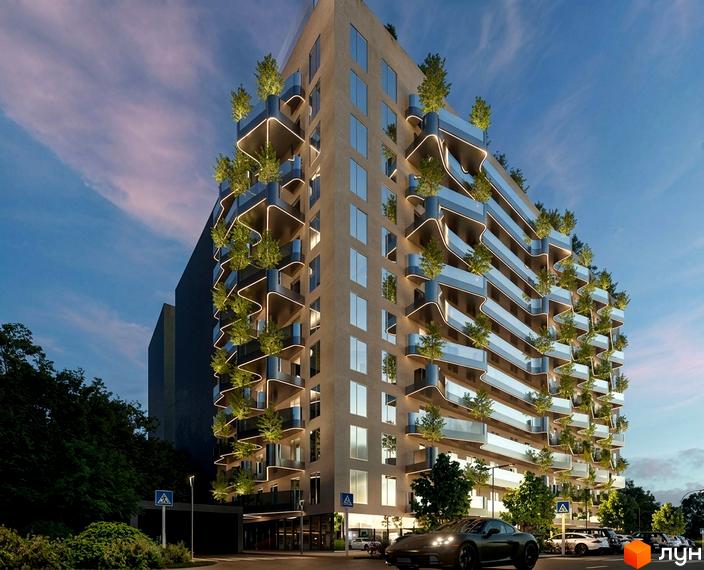 Житловий комплекс Володимирський з виступаючими балконами, озелененням та підсвіткою. Навколо будинку дерева та припарковані автомобілі.