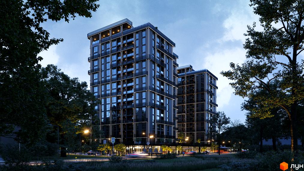 Житловий комплекс PARK AVENUE premium із темними фасадами та підсвіткою, оточений деревами та освітленою вулицею.