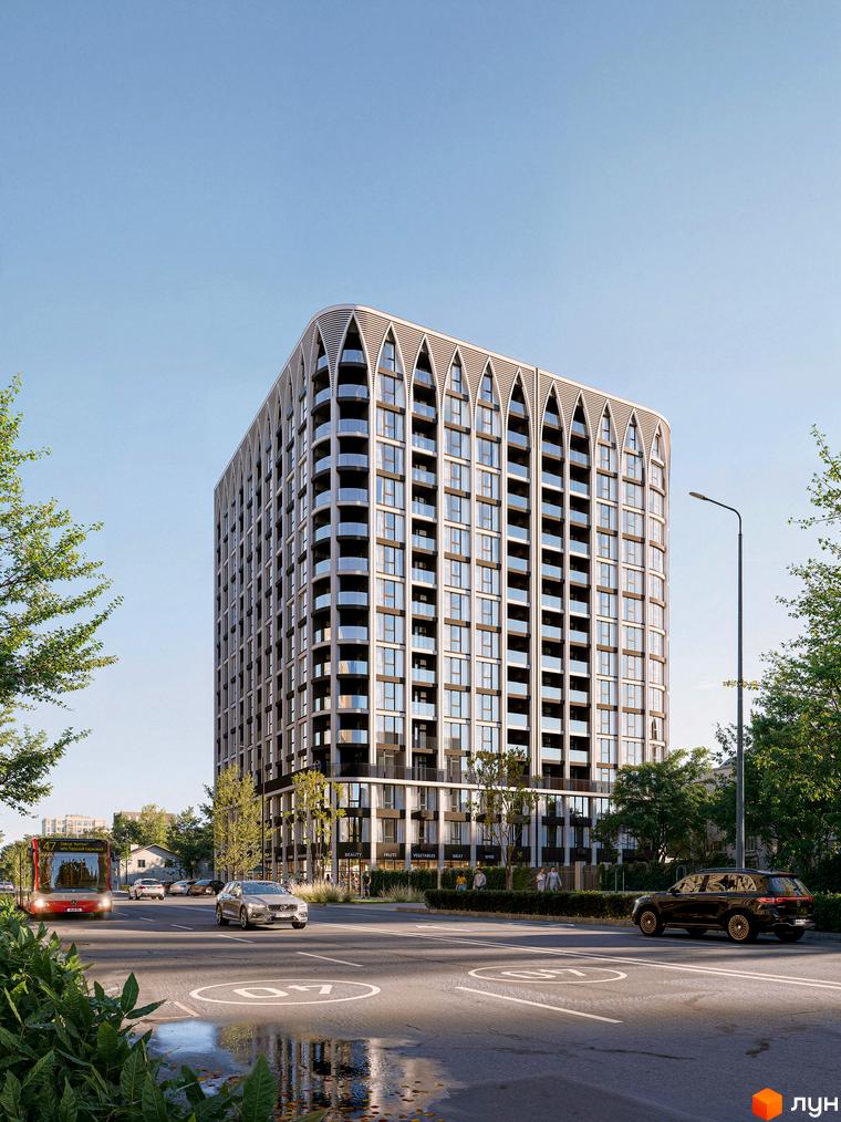 Житловий комплекс Lake Park з арковими елементами на фасаді та балконами, розташований біля дороги з автомобілями та деревами.