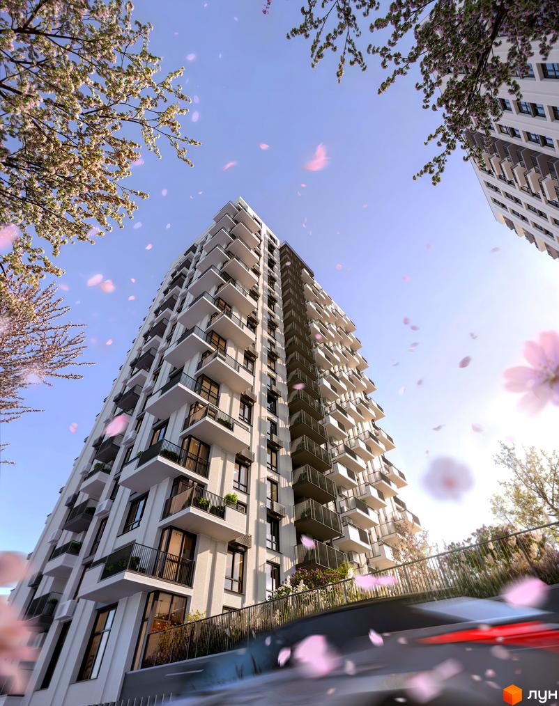 Житловий комплекс Central Park Vinnytsia з білими фасадами та балконами, оточений квітучими деревами та зеленню.