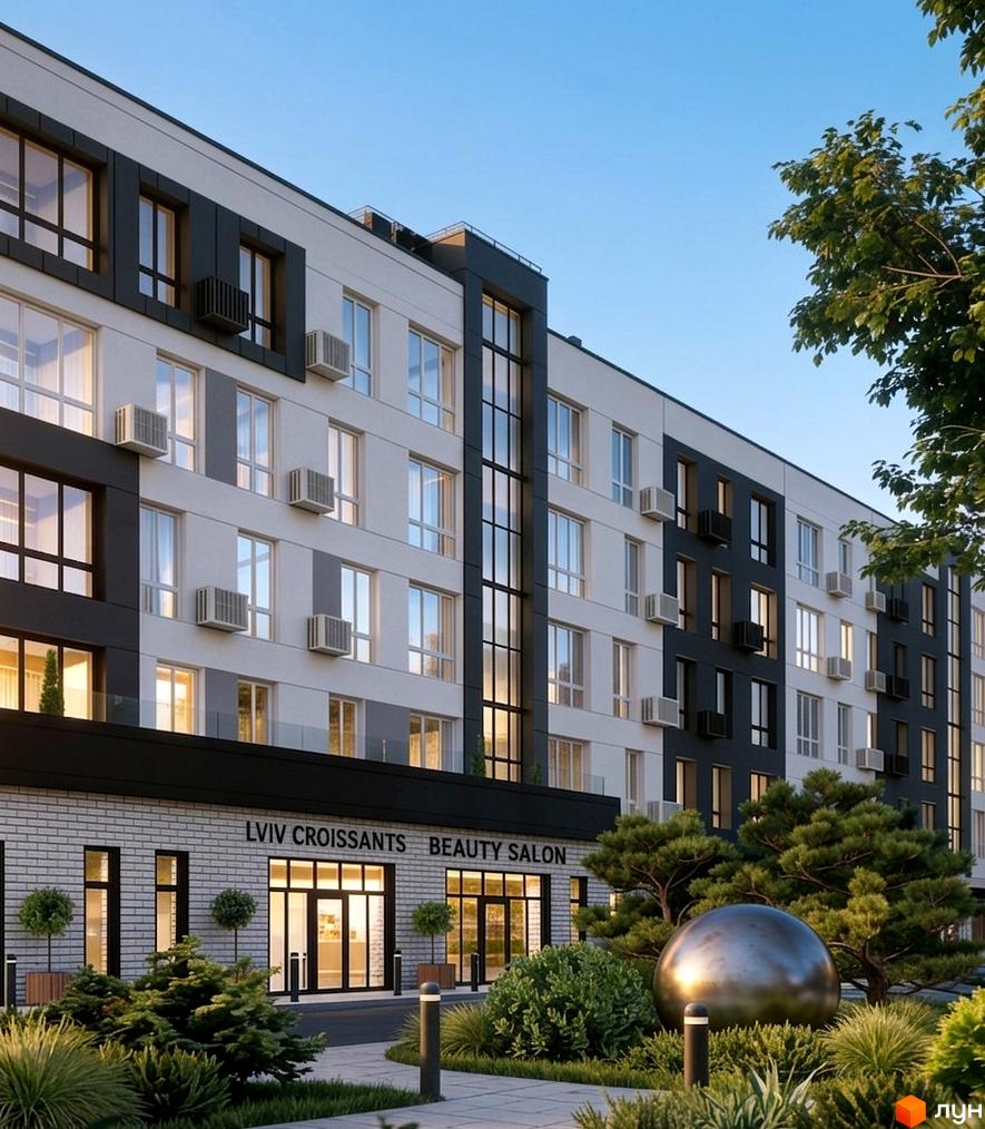 Новобудова KLEN з біло-сірим фасадом та темними акцентами, вікнами та кондиціонерами. Перед будинком зелена зона з деревами та скульптурою.