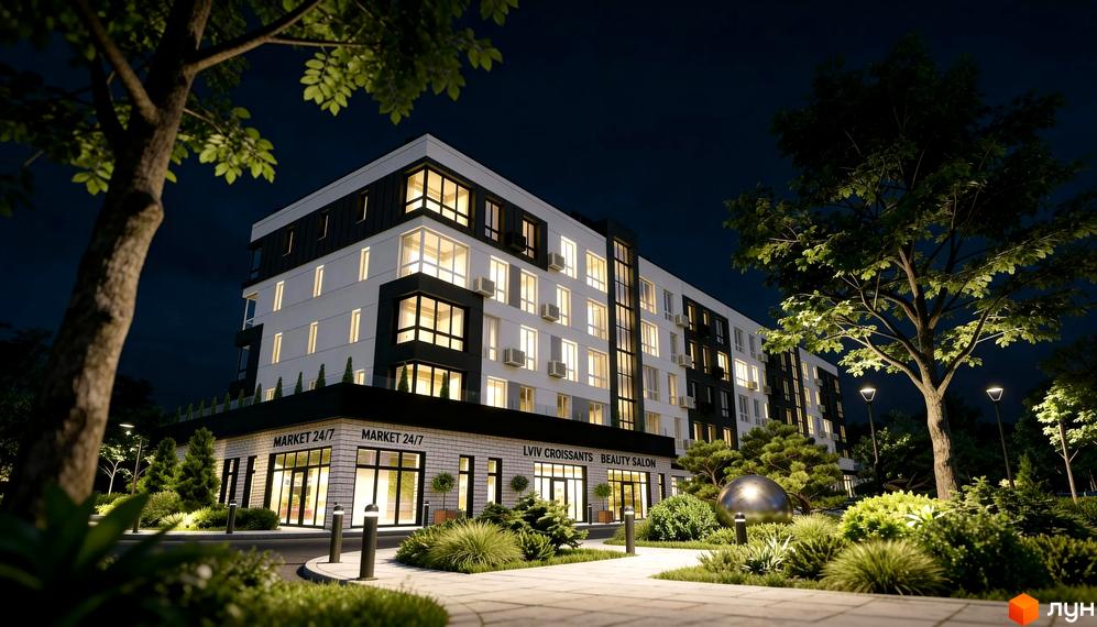 Житловий комплекс KLEN з фасадом біло-чорного кольору та підсвіченими вікнами вночі. Навколо будинку розташовані зелені насадження та ліхтарі.