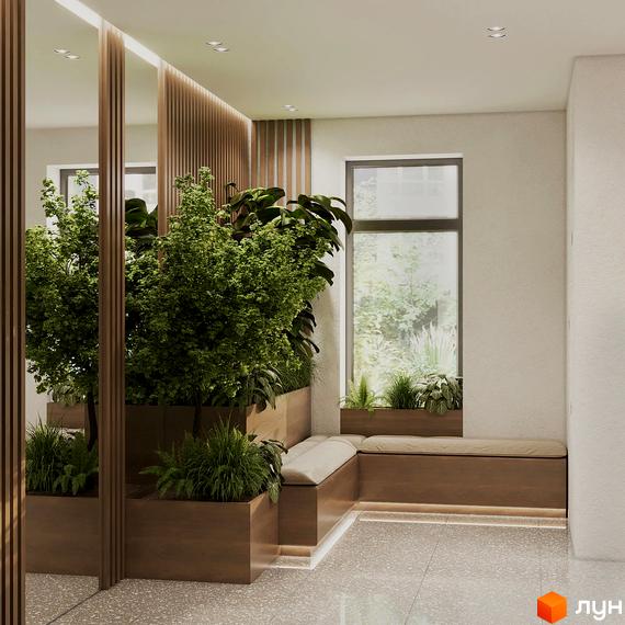 Житловий комплекс KLEN: зелений хол з великою кількістю рослин та місцем для відпочинку біля вікна. Дизайн інтер'єру новобудови.