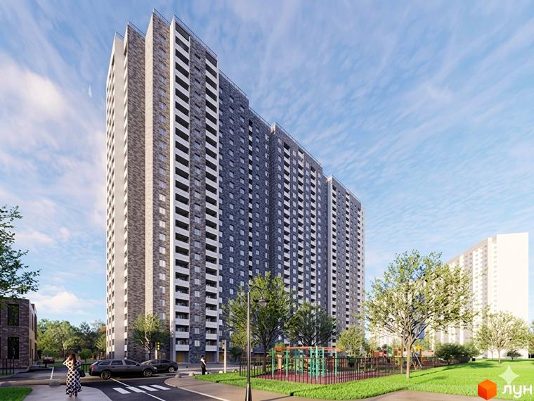 Житловий комплекс Київський: висотна будівля з сірим фасадом та балконами, дитячий майданчик та зелена зона.