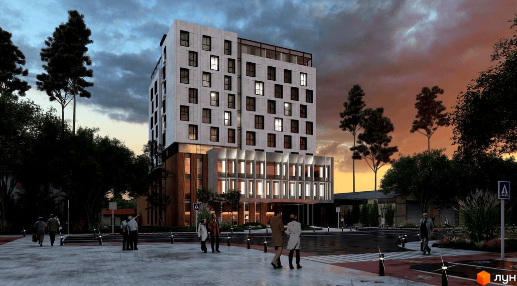 Житловий комплекс Сапфір – це багатоповерхова новобудова з білим фасадом та великими вікнами, розташована біля зеленої зони та дороги.