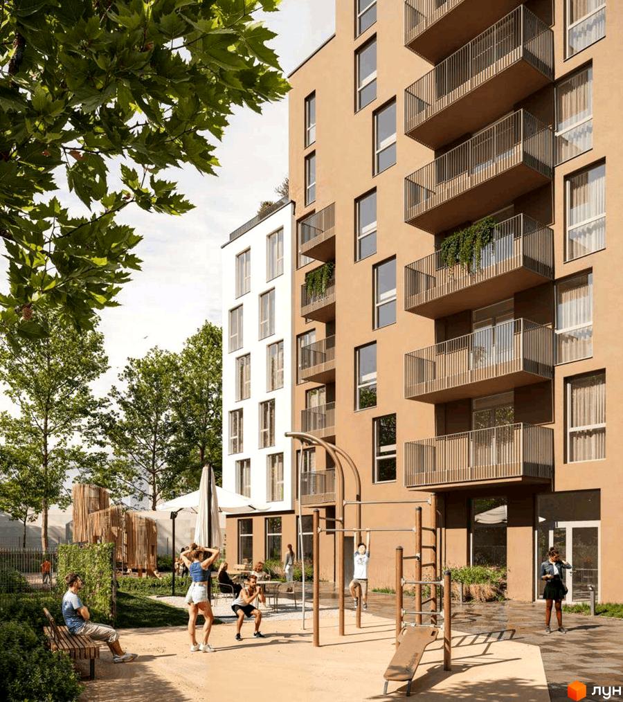 Житловий комплекс PRAUD Rise: багатоповерхові будинки світло-коричневого та білого кольорів, прибудинкова територія з зоною для спорту та відпочинку.