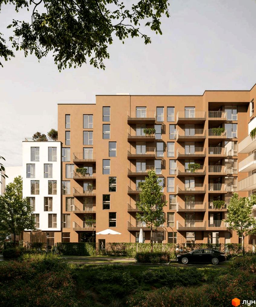 Житловий комплекс PRAUD Rise: багатоповерховий будинок з коричневим та білим фасадами, балконами, великими вікнами. Прибудинкова територія з зеленими насадженнями та автомобілем.