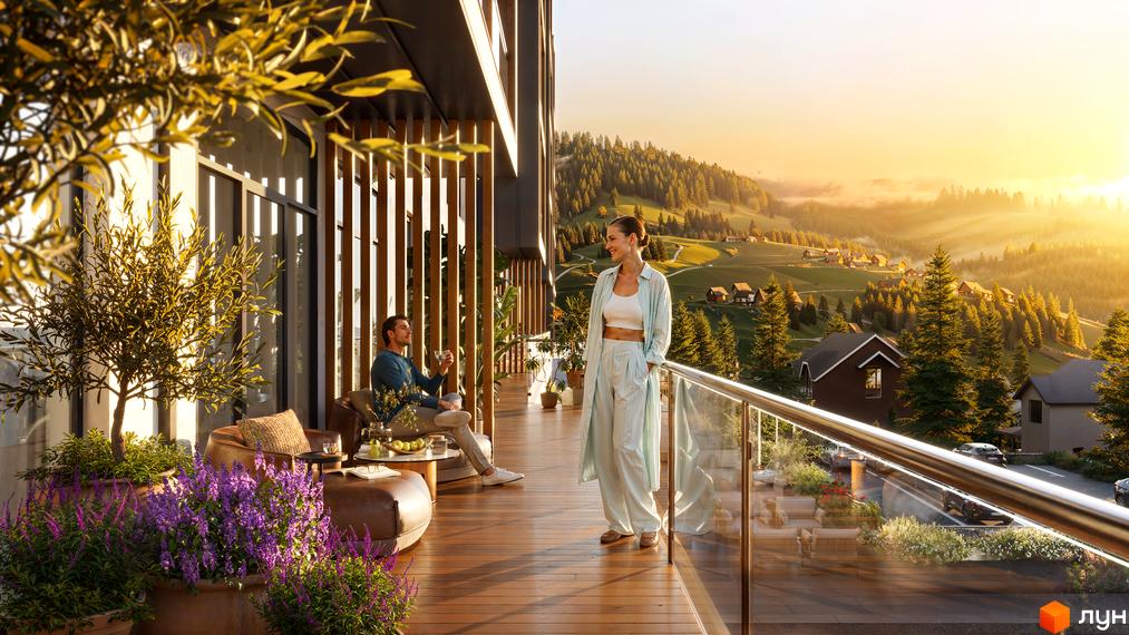 Житловий комплекс GRONO Family Residence з терасою та краєвидом на гірське село. Сучасна архітектура та зелена прибудинкова територія.