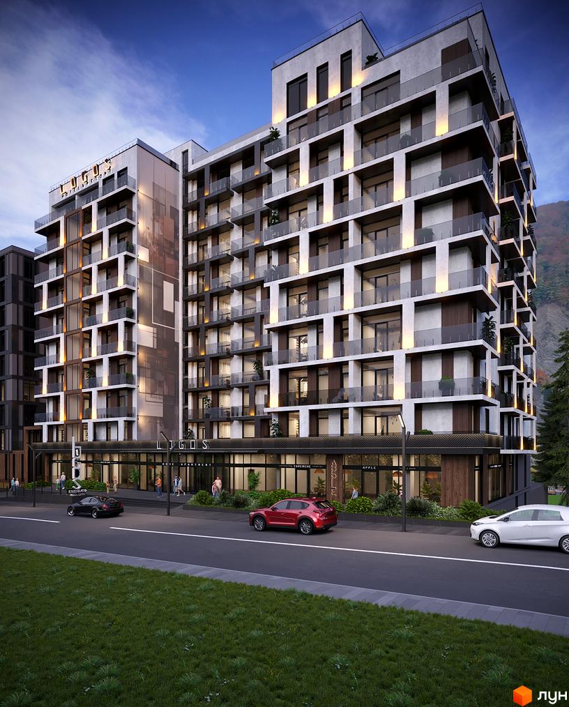 Зовнішній вигляд житлового комплексу Logos Home Apartment з фасадами з бетону та скла, балконами та освітленням. Навколо зелена зона та дорога з автомобілями.
