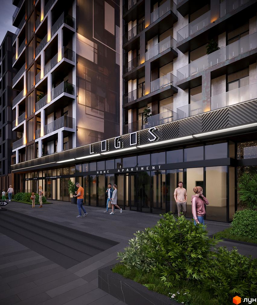 Зовнішній вигляд житлового комплексу Logos Home Apartment з балконами та скляними фасадами, перед яким розташована прибудинкова територія з кущами та пішохідною зоною.