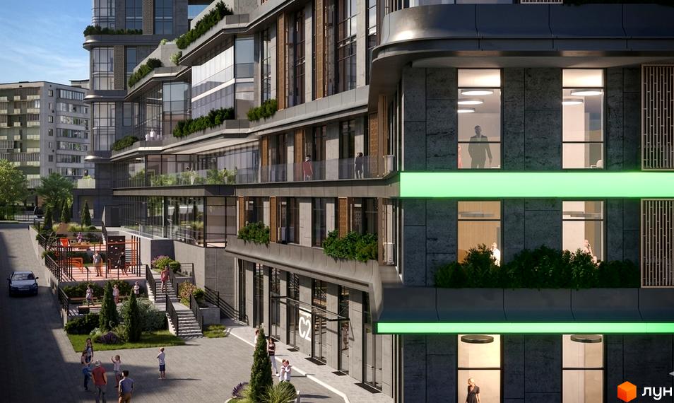 Житловий комплекс DUO Space: багатоповерховий будинок з темним фасадом, великими вікнами, зеленими смугами підсвітки та облаштованою територією з майданчиком.