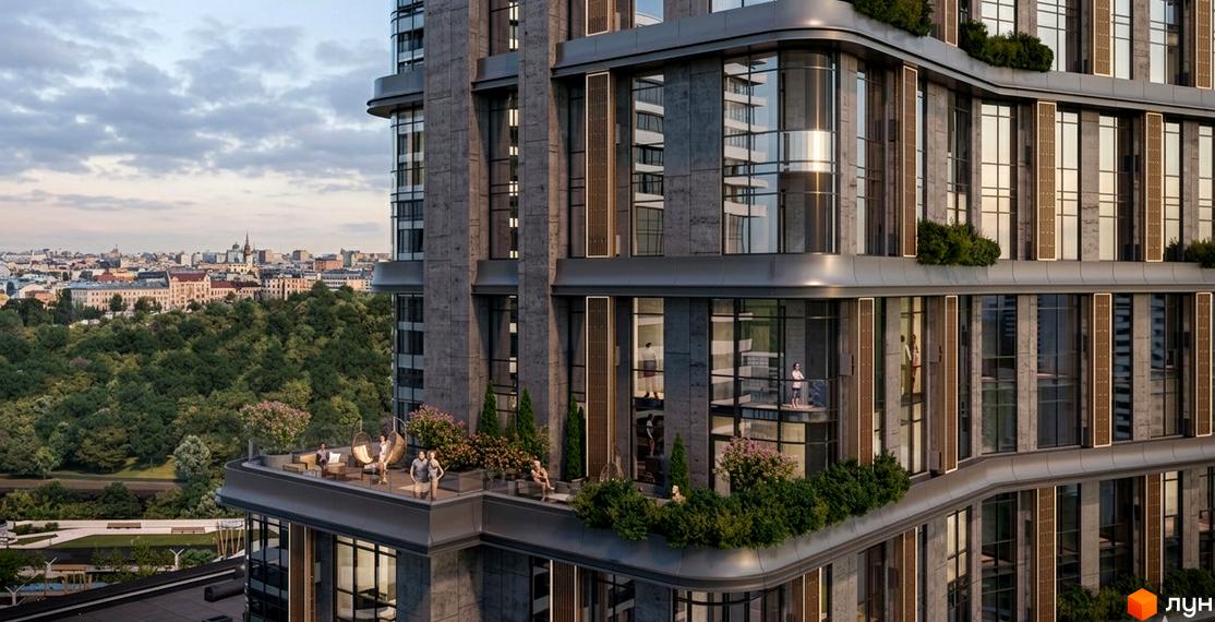 Житловий комплекс DUO Space: багатоповерховий будинок з темним фасадом, великими вікнами та озелененими терасами з видом на місто і парк.