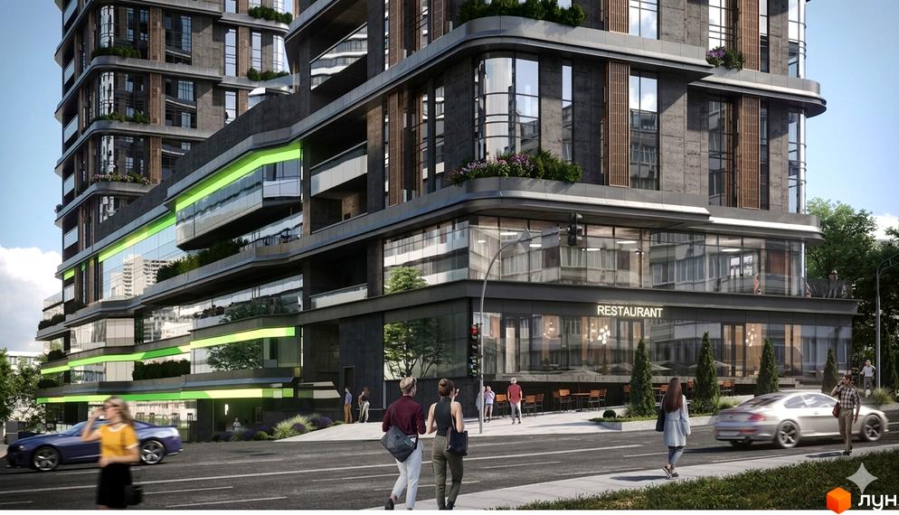 Житловий комплекс DUO Space має багатоповерхову структуру з темним фасадом, великими вікнами та горизонтальними зеленими смугами. Навколо будівлі дорога, пішоходи та озеленення.