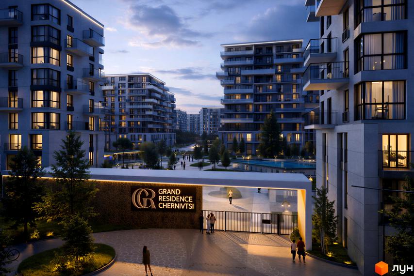 Житловий комплекс Grand Residence Chernivtsi з сучасними фасадами та балконами, оточений доглянутою прибудинковою територією з басейном та освітленням.