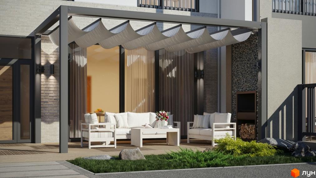 Зовнішній вигляд таунхаусів Lazur Village з терасою та зоною відпочинку. Прибудинкова територія з зеленню та декоративним камінням.