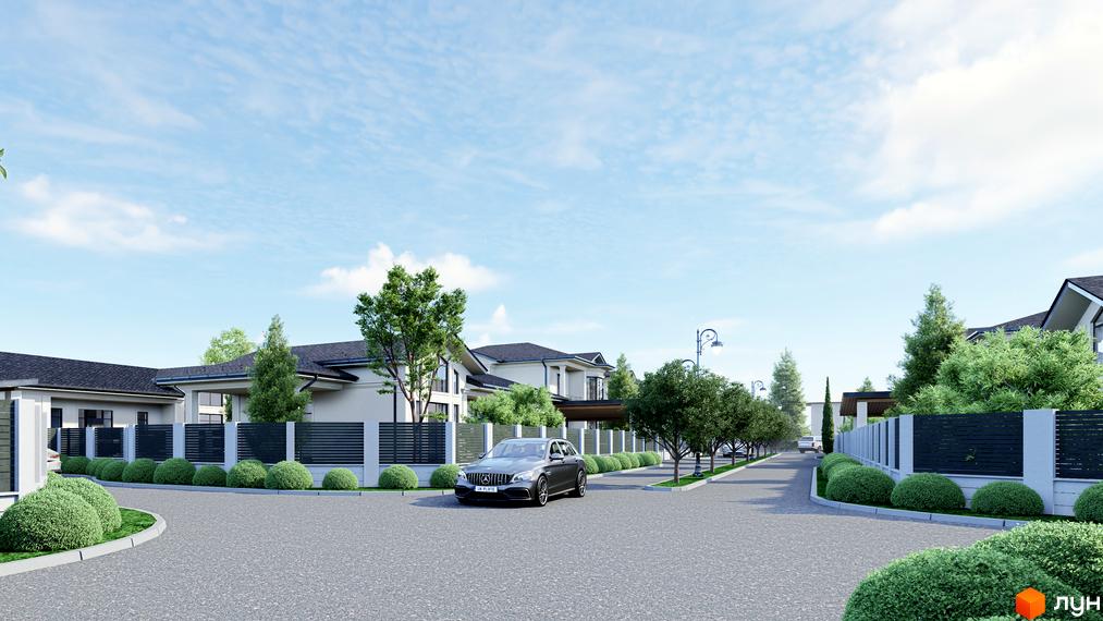 Котеджне містечко КМ Срібна алея: фасади будинків у світлих тонах, огороджені ділянки, доглянуті кущі та дерева, асфальтована дорога.