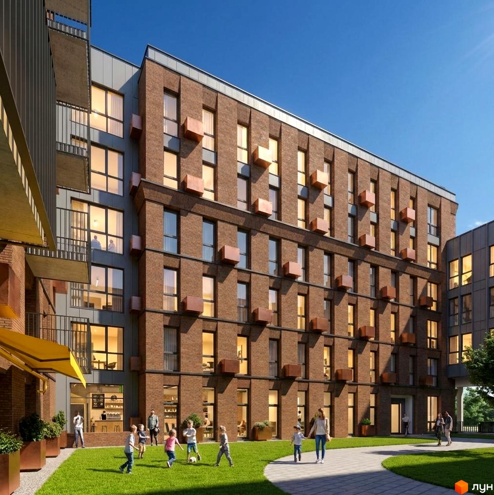 Зовнішній вигляд житлового комплексу MOVIN hotel з цегляними фасадами та великими вікнами, поруч зелений двір з дитячим майданчиком.