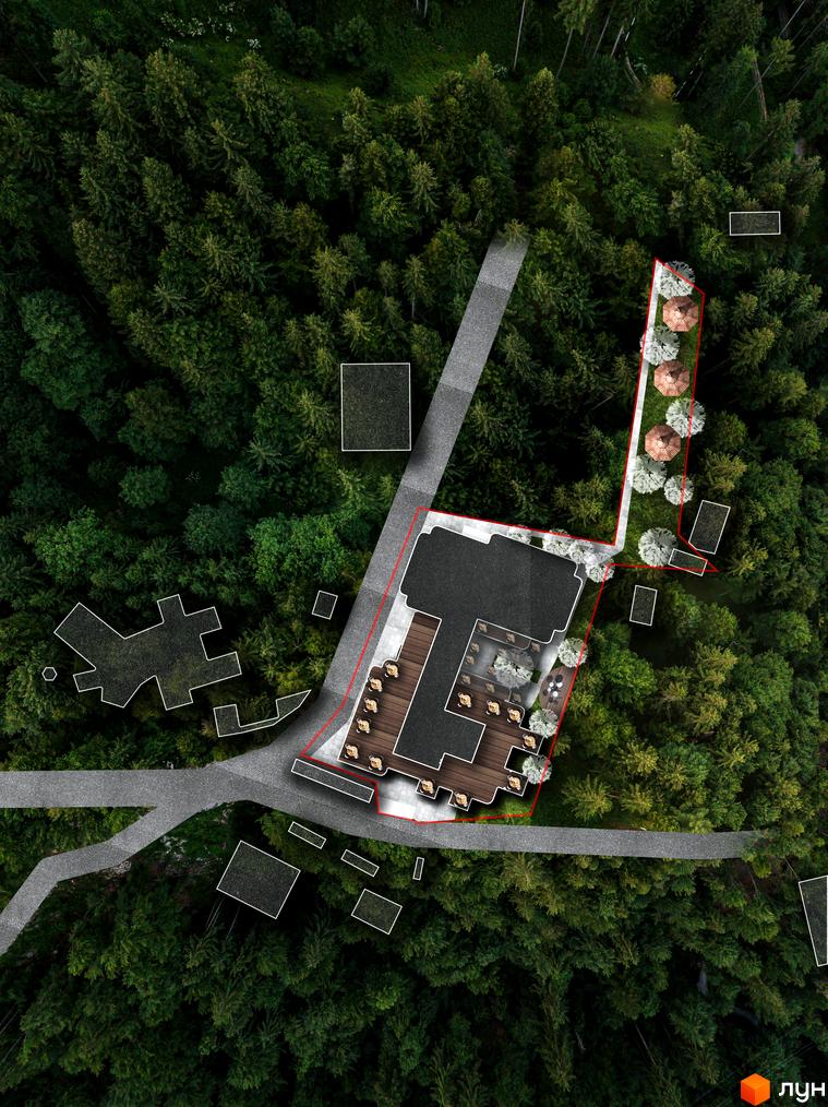 Oselia apartments - вид зверху на житловий комплекс, що розташований серед лісу, з терасою та зоною відпочинку.