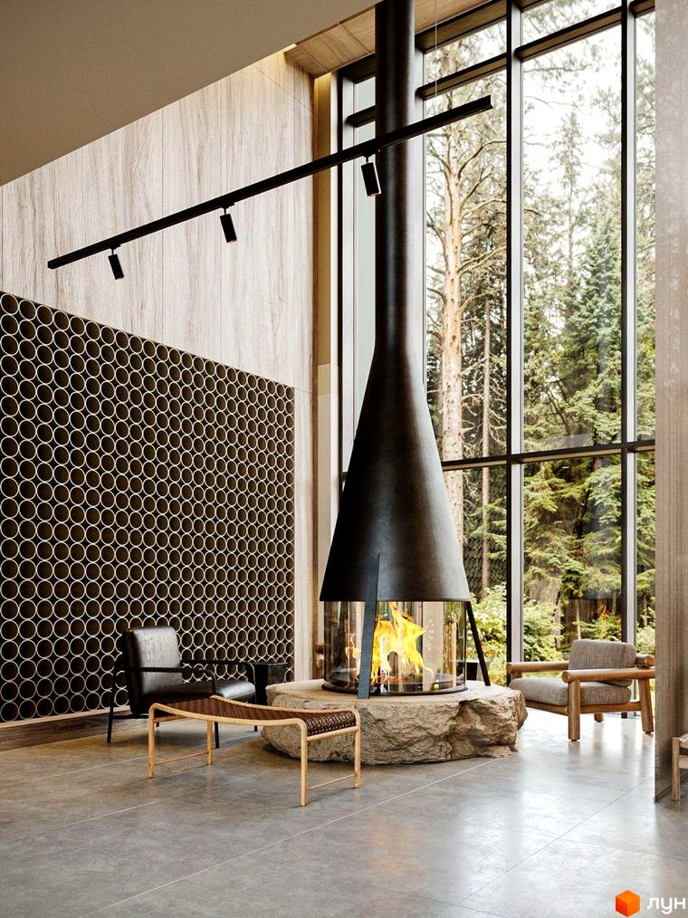 Oselia apartments: вітальня з каміном та панорамними вікнами, що виходять на ліс. Сучасний дизайн інтер'єру.