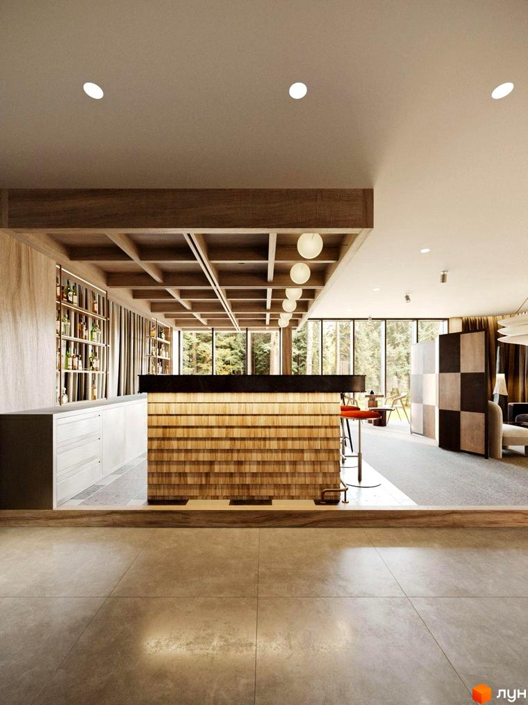 Oselia apartments: просторий бар з дерев'яною обшивкою та великими вікнами, що виходять на ліс. Інтер'єр доповнюють полиці з напоями та зони відпочинку.