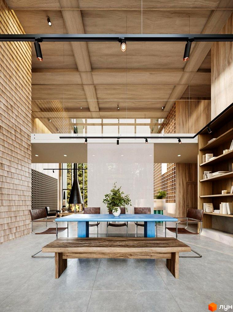 Інтер'єр просторої вітальні з дерев'яними елементами та великим столом. Oselia apartments – ваш новий дім.