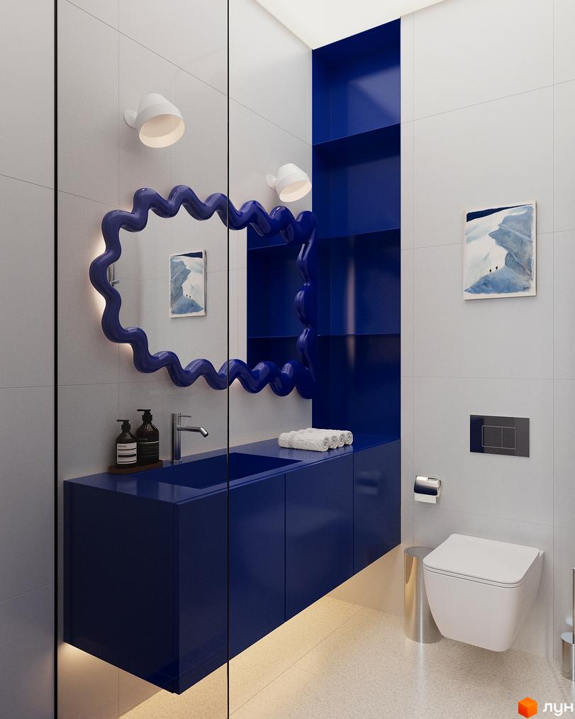 Дизайн ванної кімнати в Oselia apartments з синьою тумбою, дзеркалом хвилястої форми та білою плиткою. Функціональне планування санвузла для комфортного проживання.