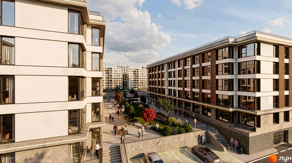 Зовнішній вигляд будівель житлового комплексу Галицький Двір з фасадами з білої штукатурки та дерев'яними елементами. Прибудинкова територія з зеленими насадженнями та місцями для відпочинку.