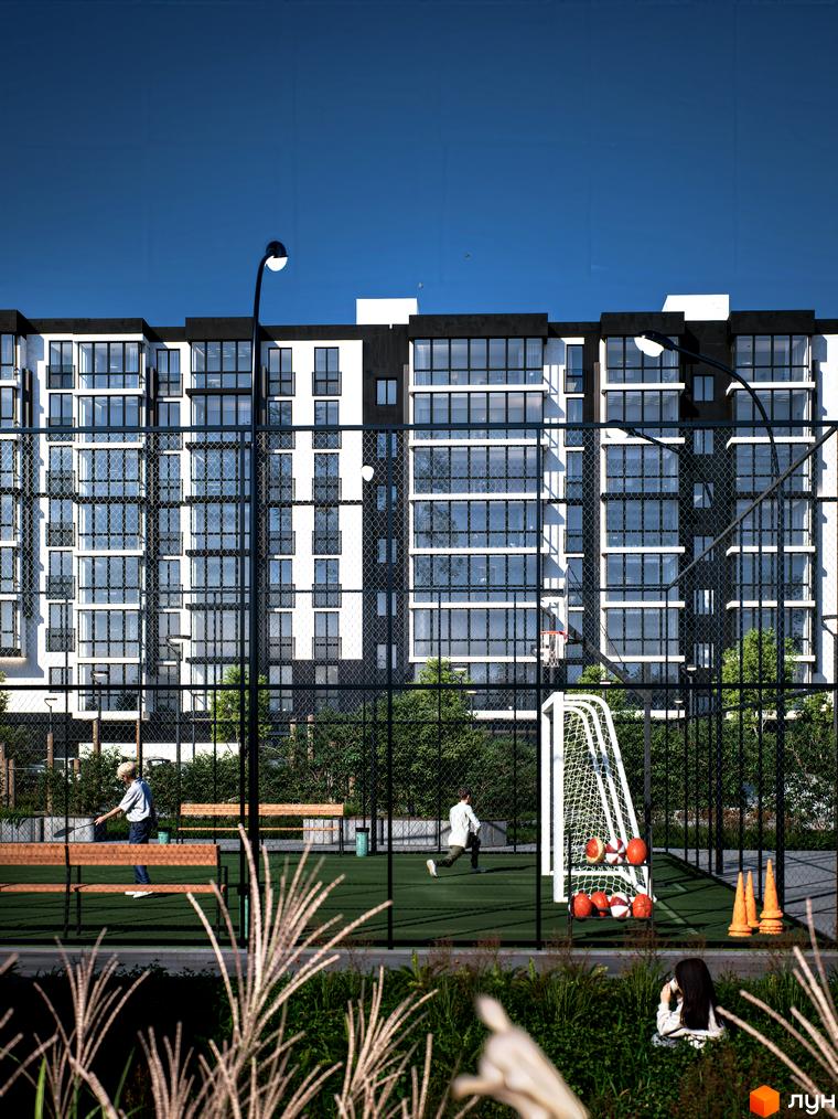 Житловий комплекс ЖК ТИSHA з багатоповерховими будинками та спортивним майданчиком для гри у футбол та баскетбол.